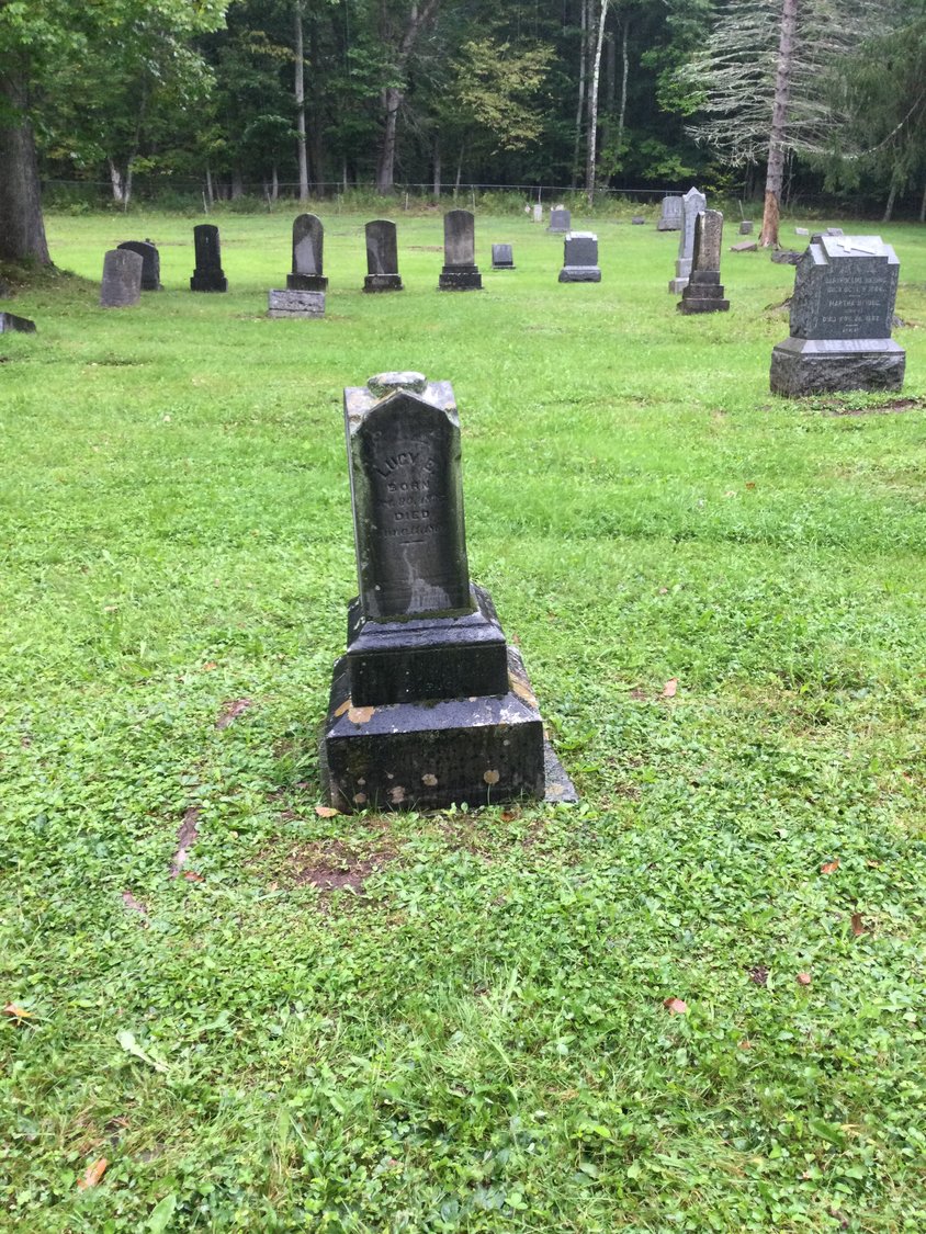 Gravestone of three siblings who died of scarlet fever in 1869.